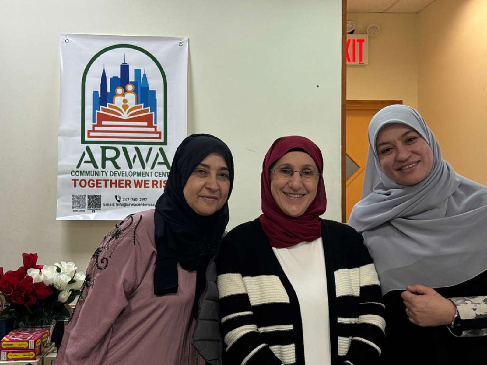 ARWA volunteers with the Together We Rise banner